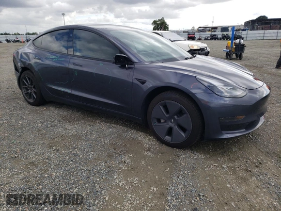 2023 Tesla Model 3 with VIN 5YJ3E1EA7PF395196, listed as a Copart auction lot 51260465 with 41,119 mi miles and Salvage title. Bid and sale history available at DreamBid. Image 4.