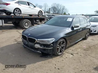 2018 BMW 5 Series M550i xDrive with VIN WBAJB9C50JB036400, listed as a IAAI auction lot 41464278 with 139,079 mi miles and . Bid and sale history available at DreamBid. Image 19.