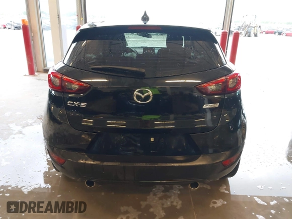 2019 Mazda CX-3 Touring z VIN JM1DKDC70K0404219, wystawiony jako IAAI lot #42148454 z przebiegiem 80 539 mil mil oraz . Historia ofert i sprzedaży dostępna na DreamBid. Obrazek 16.