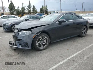 2021 Mercedes-Benz E 450 with VIN W1K1J5KB2MF140668, listed as a Copart auction lot 59515815 with 28,498 mi miles and Salvage title. Bid and sale history available at DreamBid. Image 1.