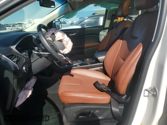2015 Ford Edge Titanium z VIN 2FMTK4K84FBB64176, wystawiony jako Copart lot #57729005 z przebiegiem 50 654 mil mil oraz Szkoda całkowita • Salvage title. Historia ofert i sprzedaży dostępna na DreamBid. Obrazek 7.
