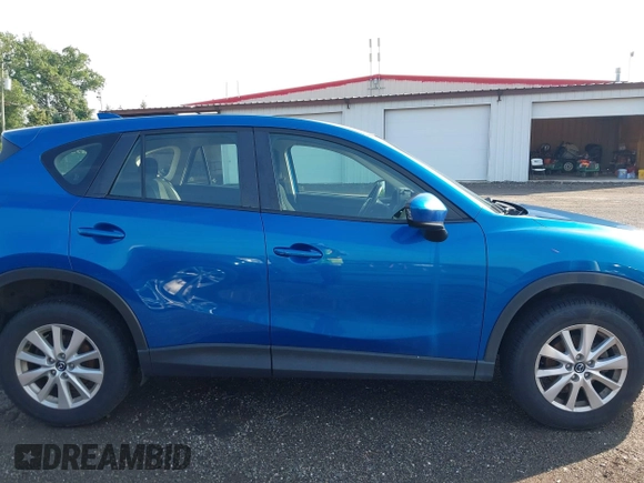 2014 Mazda CX-5 Sport z VIN JM3KE4BE7E0351982, wystawiony jako IAAI lot #42767499 z przebiegiem 154 774 mil mil oraz . Historia ofert i sprzedaży dostępna na DreamBid. Obrazek 13.