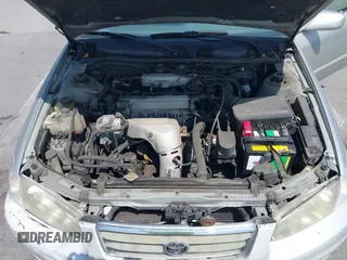 2001 Toyota Camry CE z VIN 4T1BG22K01U101673, wystawiony jako IAAI lot #42576596 z przebiegiem 200 064 mil mil oraz . Historia ofert i sprzedaży dostępna na DreamBid. Obrazek 10.