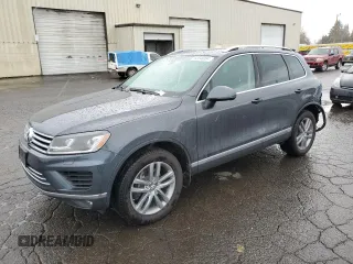 2015 Volkswagen Touareg Lux с VIN WVGEP9BP1FD008167, выставлен на аукционе Copart как лот 82048084 с пробегом 103 663 миль миль и Списание • Salvage title. История ставок и продаж доступна на DreamBid. Изображение 1.