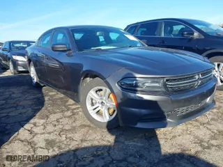 2015 Dodge Charger SE with VIN 2C3CDXBG9FH812314, listed as a IAAI auction lot 41399466 with 201,317 mi miles. Bid and sale history available at carsss.com. Image 1.