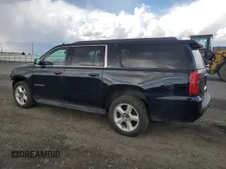 2018 Chevrolet Suburban LT with VIN 1GNSKHKC0JR266132, listed as a Copart auction lot 51337275 with 197,386 mi miles and Salvage Title. Bid and sale history available at DreamBid. Image 2.