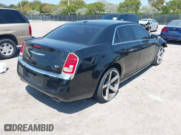 2012 Chrysler 300 with VIN 2C3CCAAG3CH112592, listed as a IAAI auction lot 42070481 with 178,980 mi miles. Bid and sale history available at carsss.com. Image 4.