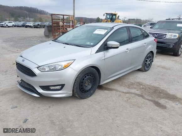 2015 Ford Focus SE with VIN 1FADP3F24FL297665, listed as a IAAI auction lot 41893672 with 105,719 mi miles. Bid and sale history available at carsss.com. Image 2.