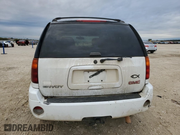 2006 GMC Envoy SLT with VIN 1GKDS13S362197312, listed as a Copart auction lot 83999074 with 217,220 mi miles and Clean Title. Bid and sale history available at carsss.com. Image 6.