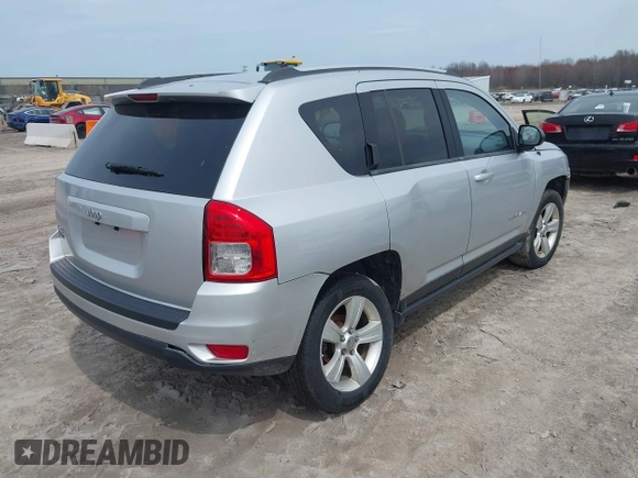2012 Jeep Compass Sport with VIN 1C4NJDBB4CD624163, listed as a IAAI auction lot 42025783 with 148,928 mi miles. Bid and sale history available at carsss.com. Image 4.
