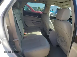 2014 Cadillac SRX Premium Collection z VIN 3GYFNGE34ES662777, wystawiony jako Copart lot #56559285 z przebiegiem 131 136 mil mil oraz Szkoda całkowita • Salvage title. Historia ofert i sprzedaży dostępna na DreamBid. Obrazek 11.