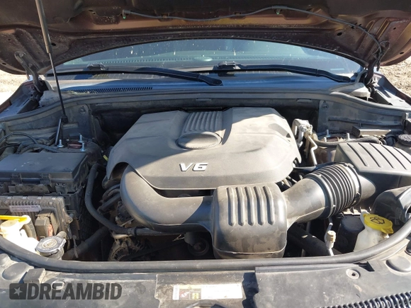 2015 Jeep Grand Cherokee Summit with VIN 1C4RJFJGXFC125131, listed as a IAAI auction lot 42475017 with 128,166 mi miles and . Bid and sale history available at DreamBid. Image 10.