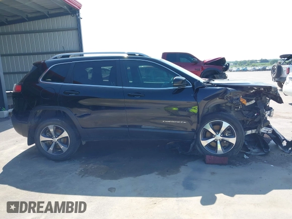 2019 Jeep Cherokee Limited с VIN 1C4PJMDXXKD135511, выставлен на аукционе IAAI как лот 42532399 с пробегом 94 317 миль миль и . История ставок и продаж доступна на DreamBid. Изображение 13.