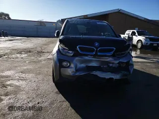 2015 BMW i3 with VIN WBY1Z4C56FV500991, listed as a Copart auction lot 43162913 with 57,885 mi miles. Bid and sale history available at carsss.com. Image 11.