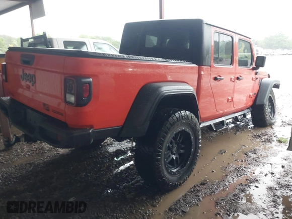 2020 Jeep Gladiator Sport S with VIN 1C6JJTAG4LL177711, listed as a IAAI auction lot 42222877 with 45,462 mi miles and . Bid and sale history available at DreamBid. Image 4.