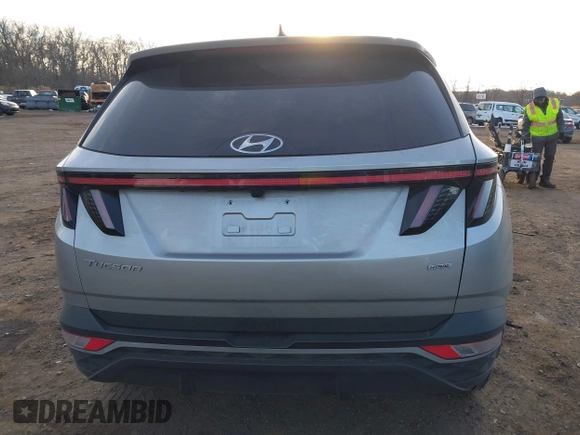 2022 Hyundai Tucson SEL with VIN 5NMJFCAE4NH060031, listed as a IAAI auction lot 41451874 with 57,228 mi miles and . Bid and sale history available at carsss.com. Image 16.
