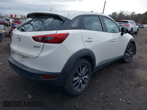 2017 Mazda CX-3 Touring with VIN JM1DKFC76H0172634, listed as a IAAI auction lot 41736544 with 48,585 mi miles. Bid and sale history available at carsss.com. Image 4.