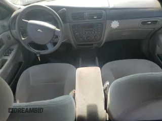 2004 Ford Taurus SE with VIN 1FAFP53U04G133586, listed as a Copart auction lot 59972925 with 228,938 mi miles and Salvage title. Bid and sale history available at DreamBid. Image 8.