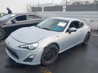 2013 Scion FR-S with VIN JF1ZNAA1XD1729862, listed as a IAAI auction lot 41143862 with 64,208 mi miles. Bid and sale history available at carsss.com. Image 2.
