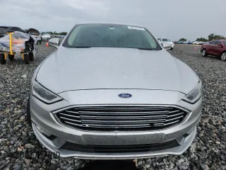 2018 Ford Fusion Titanium with VIN 3FA6P0D91JR207051, listed as a Copart auction lot 59539135 with 204,017 mi miles and Salvage title. Bid and sale history available at DreamBid. Image 5.