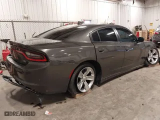 2017 Dodge Charger SXT with VIN 2C3CDXHGXHH559000, listed as a IAAI auction lot 40479178 with NaN miles. Bid and sale history available at carsss.com. Image 4.