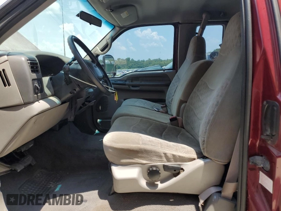 2000 Ford F-250 XL with VIN 1FTNX20L1YEB50589, listed as a Copart auction lot 63743775 with 105,448 mi miles and Salvage title. Bid and sale history available at DreamBid. Image 7.