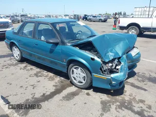 1995 Saturn SL z VIN 1G8ZK5275SZ303745, wystawiony jako IAAI lot #42280801 z przebiegiem 137 719 mil mil oraz . Historia ofert i sprzedaży dostępna na DreamBid. Obrazek 1.