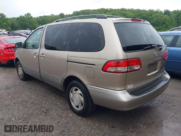 2001 Toyota Sienna LE with VIN 4T3ZF13CX1U367504, listed as a IAAI auction lot 42111583 with 302,801 mi miles and . Bid and sale history available at DreamBid. Image 3.
