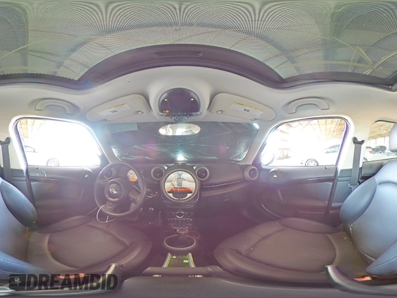2011 MINI Countryman S with VIN WMWZC5C54BWM10218, listed as a Copart auction lot 60557685 with 192,422 mi miles and Salvage title. Bid and sale history available at DreamBid. Image 14.