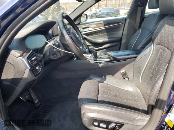 2019 BMW 5 Series M550i xDrive with VIN WBAJB9C51KB464722, listed as a Copart auction lot 53575135 with 70,187 mi miles and Salvage title. Bid and sale history available at DreamBid. Image 7.