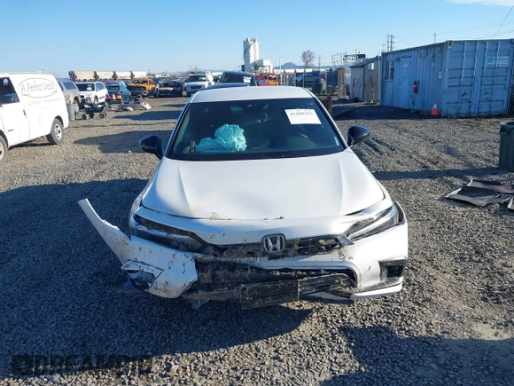 2024 Honda Civic Sport z VIN 2HGFE2F58RH550597, wystawiony jako IAAI lot #41688202 z przebiegiem 7 198 mil mil oraz . Historia ofert i sprzedaży dostępna na DreamBid. Obrazek 12.