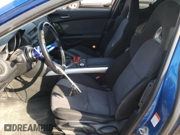 2004 Mazda RX-8 with VIN JM1FE173440114865, listed as a Copart auction lot 75385304 with 67,943 mi miles and Clean Title. Bid and sale history available at DreamBid. Image 7.