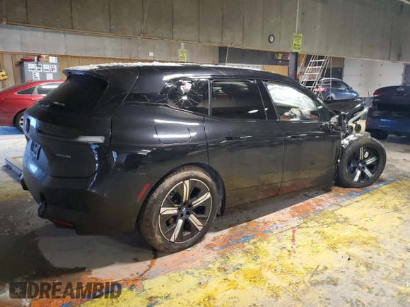 2022 BMW iX xDrive50 with VIN WB523CF05NCJ77119, listed as a Copart auction lot 88254335 with 18,945 mi miles and Salvage Title. Bid and sale history available at carsss.com. Image 3.