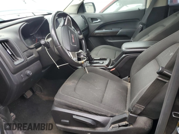 2016 GMC Canyon 2WD SLE with VIN 1GTG5CE35G1256661, listed as a Copart auction lot 82244644 with 104,496 mi miles and Clean Title. Bid and sale history available at carsss.com. Image 7.