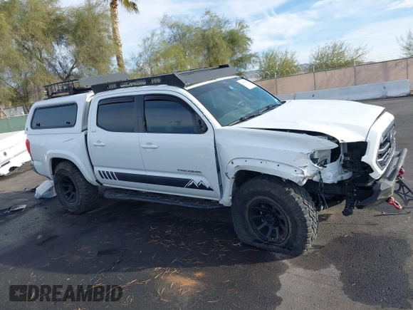 2019 Toyota Tacoma SR z VIN 3TMCZ5AN6KM284101, wystawiony jako IAAI lot #41099466 z przebiegiem 36 119 mil mil oraz . Historia ofert i sprzedaży dostępna na DreamBid. Obrazek 13.