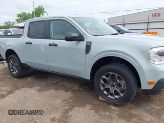 2023 Ford Maverick XL with VIN 3FTTW8E33PRA57039, listed as a IAAI auction lot 42120953 with 18,336 mi miles and . Bid and sale history available at DreamBid. Image 14.