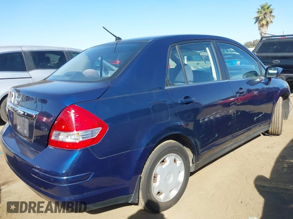 2009 Nissan Versa 1.8 S with VIN 3N1BC11E29L360857, listed as a IAAI auction lot 40629379 with 114,499 mi miles. Bid and sale history available at carsss.com. Image 4.