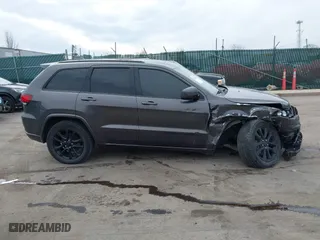 2018 Jeep Grand Cherokee Laredo E with VIN 1C4RJFAG4JC464783, listed as a IAAI auction lot 41664453 with 106,466 mi miles. Bid and sale history available at carsss.com. Image 13.