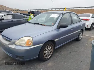 2003 Kia Rio with VIN KNADC125736236506, listed as a IAAI auction lot 41467649 with 109,975 mi miles. Bid and sale history available at carsss.com. Image 2.