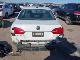 2014 Volkswagen Jetta Sedan TDI with VIN 3VWLL7AJ8EM284323, listed as a IAAI auction lot 41712828 with 192,625 mi miles. Bid and sale history available at carsss.com. Image 6.