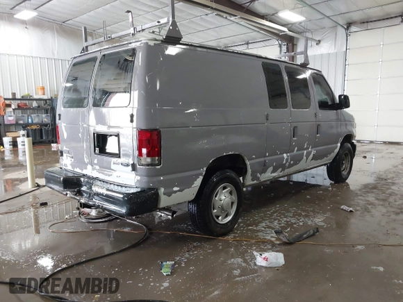 2014 Ford Econoline Cargo Commercial with VIN 1FTNE2EW4EDA64221, listed as a IAAI auction lot 41628147 with 190,018 mi miles and . Bid and sale history available at DreamBid. Image 4.