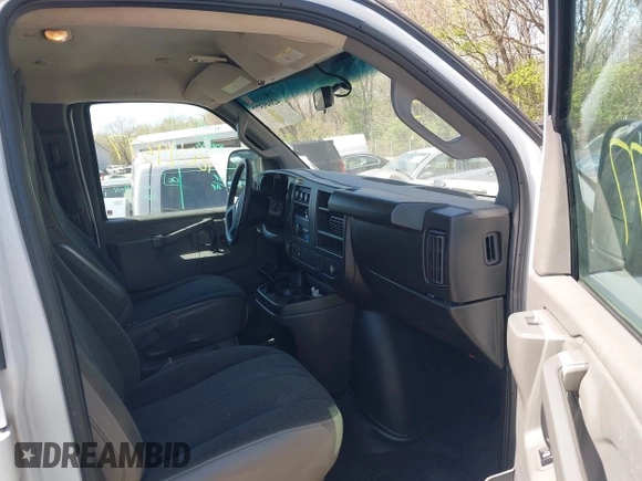 2020 Chevrolet Express Cargo Van with VIN 1GCWGAFG9L1213396, listed as a IAAI auction lot 42049377 with 122,571 mi miles. Bid and sale history available at carsss.com. Image 5.