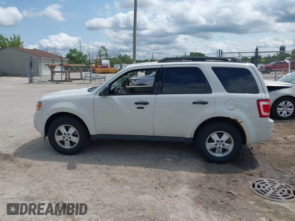 2012 Ford Escape XLT z VIN 1FMCU9DG2CKB18584, wystawiony jako IAAI lot #42469881 z przebiegiem 166 469 mil mil oraz . Historia ofert i sprzedaży dostępna na DreamBid. Obrazek 14.