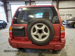 1999 Suzuki Vitara JLS z VIN 2S3TE52V6X6110719, wystawiony jako Copart lot #44219825 z przebiegiem 190 311 mil mil oraz Szkoda całkowita • Salvage title. Historia ofert i sprzedaży dostępna na DreamBid. Obrazek 6.
