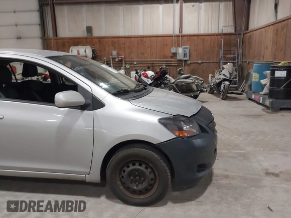 2008 Toyota Yaris with VIN JTDBT903781251568, listed as a IAAI auction lot 42090260 with 264,356 mi miles. Bid and sale history available at carsss.com. Image 12.