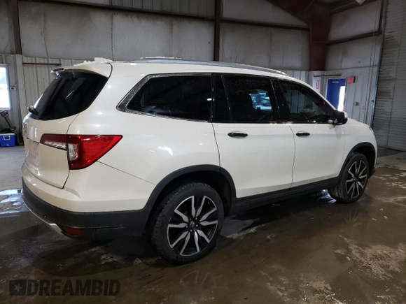 2019 Honda Pilot Touring 7-Passenger with VIN 5FNYF6H65KB049695, listed as a Copart auction lot 43444365 with 79,023 mi miles and Salvage Title. Bid and sale history available at DreamBid. Image 3.