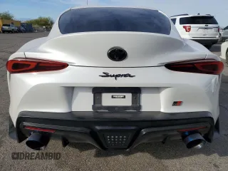 2023 Toyota GR Supra 3.0 with VIN WZ1DB0G00PW055929, listed as a Copart auction lot 76407574 with 16,889 mi miles and Salvage Title. Bid and sale history available at carsss.com. Image 6.