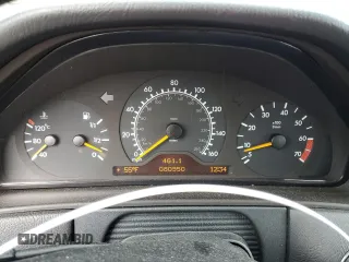 1999 Mercedes-Benz E-Class with VIN WDBJF65H0XA797390, listed as a Copart auction lot 55081405 with 80,950 mi miles and Salvage Title. Bid and sale history available at carsss.com. Image 9.