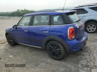 2016 MINI Countryman S with VIN WMWZC5C59GWU02414, listed as a Copart auction lot 59950285 with 106,151 mi miles and Salvage title. Bid and sale history available at DreamBid. Image 2.