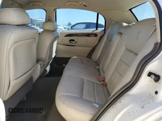 1999 Lincoln Town Car Signature z VIN 1LNHM82W4XY615634, wystawiony jako Copart lot #48886235 z przebiegiem 207 411 mil mil oraz Szkody całkowita. Historia ofert i sprzedaży dostępna na DreamBid. Obrazek 10.